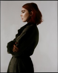 Y wool and polyester u-tapered coat and pants; Jacquie Aiche earrings.