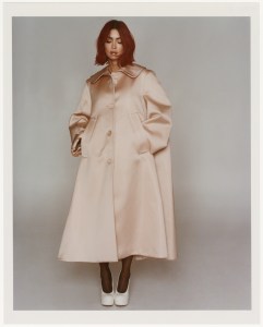 Altuzarra satin coat; Maison Margiela pumps; Wolford tights; Pamela Love necklace.