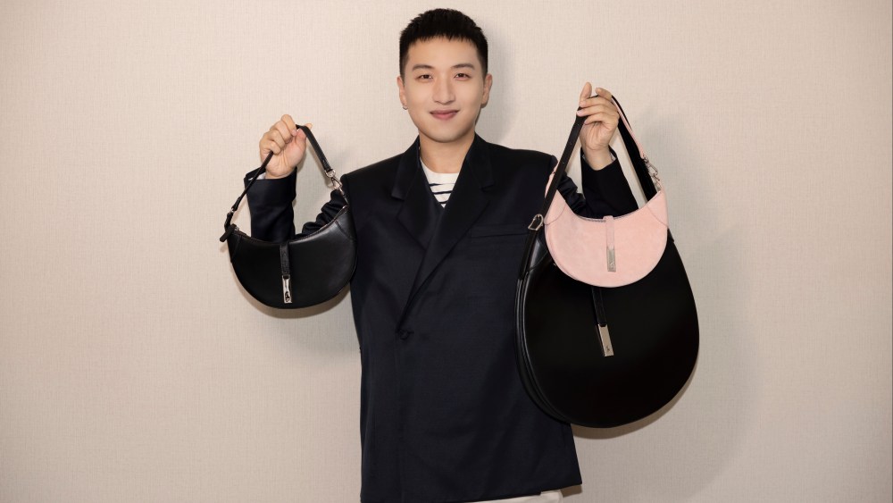 Mr. Bags carrying three styles of the Ralph Lauren Polo ID bag exclusive to China