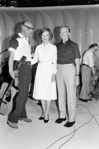 Rosalynn Carter (2nd from L) and Jimmy Carter (2nd from R) attend an outdoor party, celebrating organized labor, at the White House in Washington, D.C., on September 1, 1980.