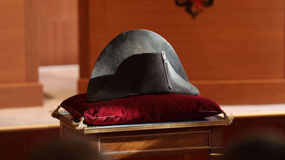 PARIS, FRANCE - NOVEMBER 19: The bicorne black beaver hat belonging to Napoleon Bonaparte when he ruled the French empire in the 19th century, is seen during the auction sale in Paris, France on November 19, 2023. The hat has been sold for 1.9m at auction. (Photo by Mohamad Salaheldin Abdelg Alsayed/Anadolu via Getty Images)
