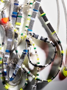 “The mix of sterling, hard stone and lacquer, referencing traditional hand-cut Heishi beads.” - Reed Krakoff