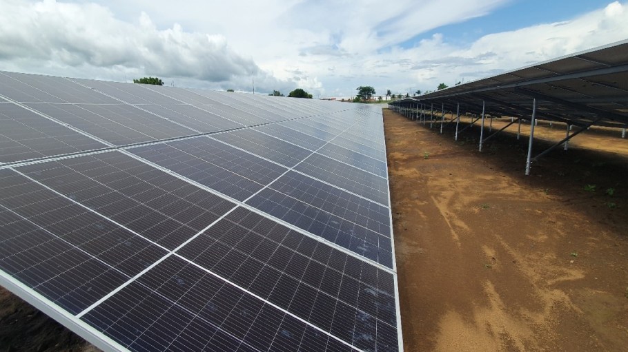 Sae-A Trading solar panels in an open field.