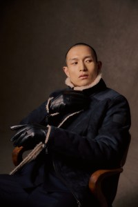 Scotch & Soda polyester shearling jacket worn over Samuelsohn wool and Roica elastane suit; Barbour gloves.