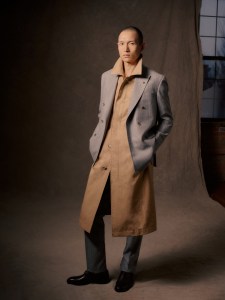 Jack Victor Super 180's wool flannel suit; Boss cotton trenchcoat; Ted Baker shoes.