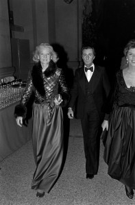 C.Z. Guest escorted by Count Vega del Ren with Geraldine Stutz (F,R) attend the opening party for the Hapsburg Exhibition at the Metropolitan Museum of Art in New York City on December 3, 1979. C.Z Guest wears a gown by Tracy Mills.
