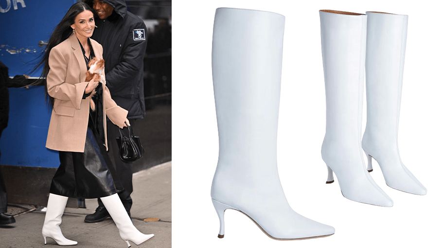 Demi Moore wearing white heeled boots leaving a building in New York City.