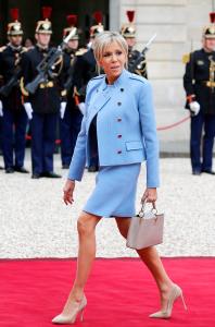 Wife of France's newly-elected President Emmanuel Macron, Brigitte Trogneux arrives at the Elysee Presidential Palace for the handover ceremony between France's newly-elected President Emmanuel Macron and outgoing President Francois Hollande on May 14, 2017 in Paris, France.