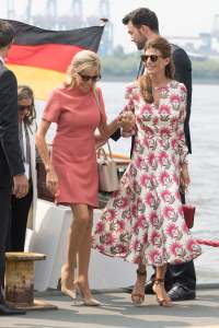 Brigitte Macron and Juliana Awada, wife of Mauricio Macri, Presidentof Argentina, leave the boat "Diplomat" on the river Elbe as they take part in the G20 Summit Spouse Programme on July 7, 2017 in Hamburg, Germany.