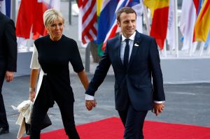 French President Emmanuel Macron and his wife Brigitte Macron arrive to attend a concert at the Elbphilharmonie philharmonic concert hall on the first day of the G20 economic summit on July 7, 2017 in Hamburg, Germany.