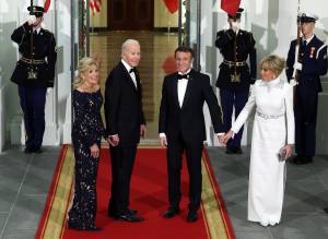 U.S. President Joe Biden and first lady Jill Biden welcome French President Emmanuel Macron and his wife Brigitte Macron to the North Portico of the White House ahead of the state dinner on December 1, 2022 in Washington, DC.