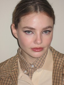 A look at Kristine Froseth getting ready for the Miu Miu Fall 2024 show.