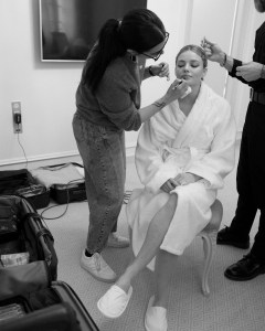 A look at Kristine Froseth getting ready for the Miu Miu Fall 2024 show.