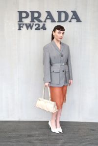 MILAN, ITALY - FEBRUARY 22: Emma Chamberlain attends the Prada Fall/Winter 2024 Womenswear fashion show during Milan Fashion Week Fall/Winter 2024 - 2025 on February 22, 2024 in Milan, Italy. (Photo by Vittorio Zunino Celotto/Getty Images for Prada)