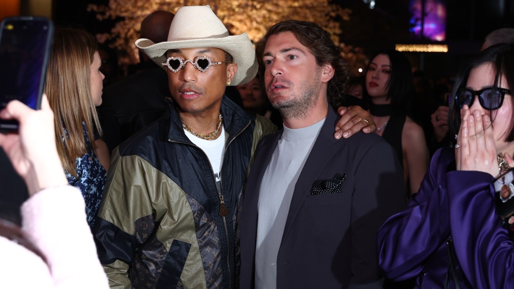 Pharrell Williams (L) and XX attends Tiffany & Co.'s opening celebration for the House's 'Tiffany Wonder' exhibition at the TOKYO NODE gallery on April 11, 2024 in Tokyo, Japan. (Photo by Graham Denholm/Getty Images for Tiffany & Co.)