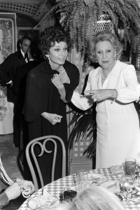 Audrey Hepburn (C) attends Irving "Swifty" Lazar's Academy Awards party at the Bistro Restaurant in Los Angeles, California, on March 29, 1976.