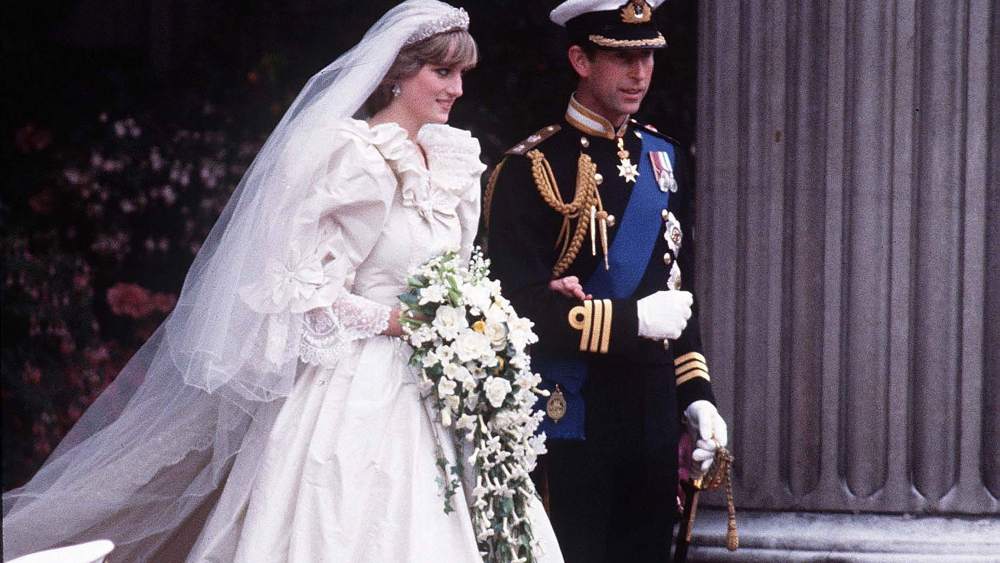 Prince Charles, Prince of Wales and Diana, Princess of Wales, wearing a wedding dress designed by David and Elizabeth Emanuel and the Spencer family Tiara, leave St. Paul's Cathedral following their wedding on July 29, 1981 in London, England.