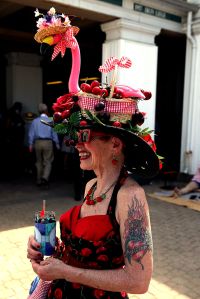 LOUISVILLE, KY - MAY 02:  A woman wearing a festive hat looks on prior to the 141st running of the Kentucky Derby at Churchill Downs on May 2, 2015 in Louisville, Kentucky.  (Photo by Andy Lyons/Getty Images)