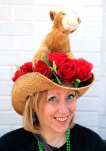 LOUISVILLE, KY - MAY 03:  A race fan wearing a festive hat attends the 140th running of the Kentucky Derby at Churchill Downs on May 3, 2014 in Louisville, Kentucky.  (Photo by Jamie Squire/Getty Images)