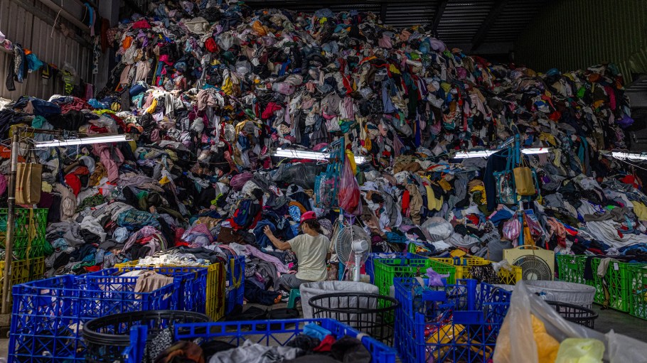 A vast pile of unsorted second-hand clothes are seen at a facility operated by Zheng-chuan textile recycling factory on July 15, 2022 in New Taipei City, Taiwan.