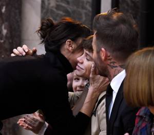 Victoria Beckham embraces husband David Beckham and children, Brooklyn, Romeo, Cruise and Harper after her Fall RTW 2018 show.