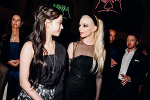 Haerin and Anya Taylor-Joy at Dior Pre-Fall 2024 Show held at the Brooklyn Museum on April 15, 2024 in New York.