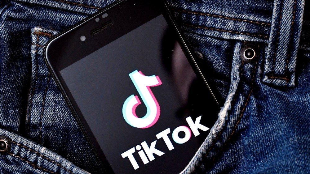 Logo of TikTok, a mobile app and social network for creating and sharing short videos by ByteDance company is seen on the screen of an smartphone. The app was created in 2016 and developed by the Chinese company ByteDance. Photo/Petr Svancara (CTK via AP Images)