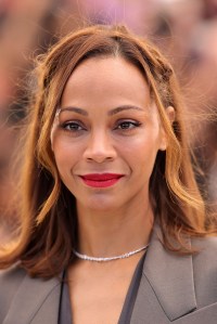 CANNES, FRANCE - MAY 19: Zoe Saldana attends the "Emilia Perez" Photocall at the 77th annual Cannes Film Festival at Palais des Festivals on May 19, 2024 in Cannes, France. (Photo by Neilson Barnard/Getty Images)