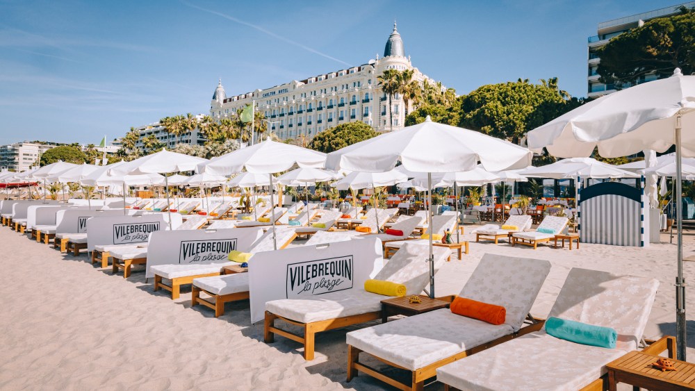 The Vilebrequin beach club in front of the Carlton hotel in Cannes, France.