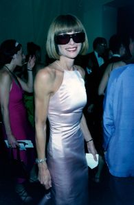 Anna Wintour and guest attend the CFDA awards dinner in 1999.