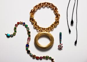 Retrouvaí Treasure Chest necklace 18-karat gold setting with tourmaline, tanzanite, fire opal, turquoise, aquamarine, emerald, morganite and Ethiopian opal; Renato Cipullo 18-karat gold bangle and chain; Karina Choudhrie Jewels Deep Sea Prism high jewelry earrings in 18-karat rose gold with diamonds, multicolored spinels and chrysocolla.