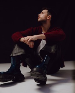 Givenchy cashmere cardigan, Amiri cotton tank top and Fendi leather pants.