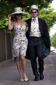 Leigh-Anne Tucker, 24, from South Africa and Keith McDonnell wearing a creation by society milliner Serafina Grafton-Beaves on Ladies Day at Royal Ascot. The outfit features 20 notes with the face of BBC Ascot pundit Willie Carson.