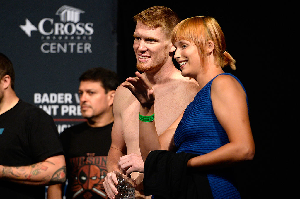 BANGOR, ME - AUGUST 15:  (L-R) Sam Alvey and wife McKey Sullivan stand on stage during the UFC fight night weigh-in at the Cross Insurance Center on August 15, 2014 in Bangor, Maine. (Photo by Jeff Bottari/Zuffa LLC/Zuffa LLC via Getty Images)