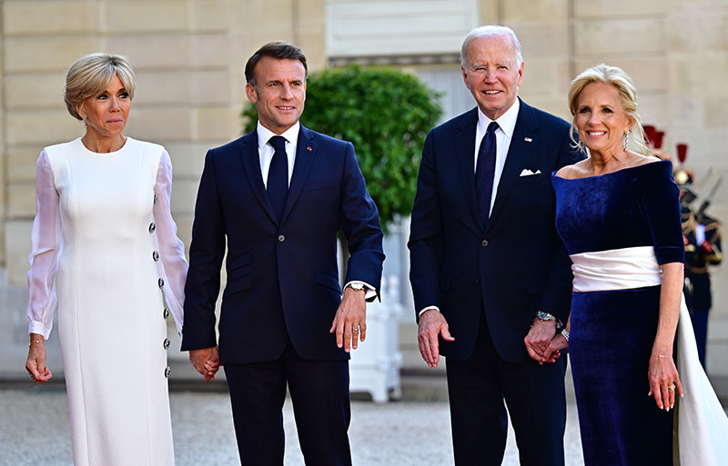 PARIS, FRANCE - JUNE 8: (L-R) Brigitte Macron, French President Emmanuel Macron, US President Joe Biden and first lady Jill Biden in Schiaparelli dress visit Elysee Palace on June 8, 2024 in Paris, France. U.S. President Joe Biden is in France to commemorate the 80th anniversary of the invasion of Normandy and to emphasize the continued role of the United States in helping to protect democratic values in Europe. (Photo by Christian Liewig - Corbis/Corbis via Getty Images)