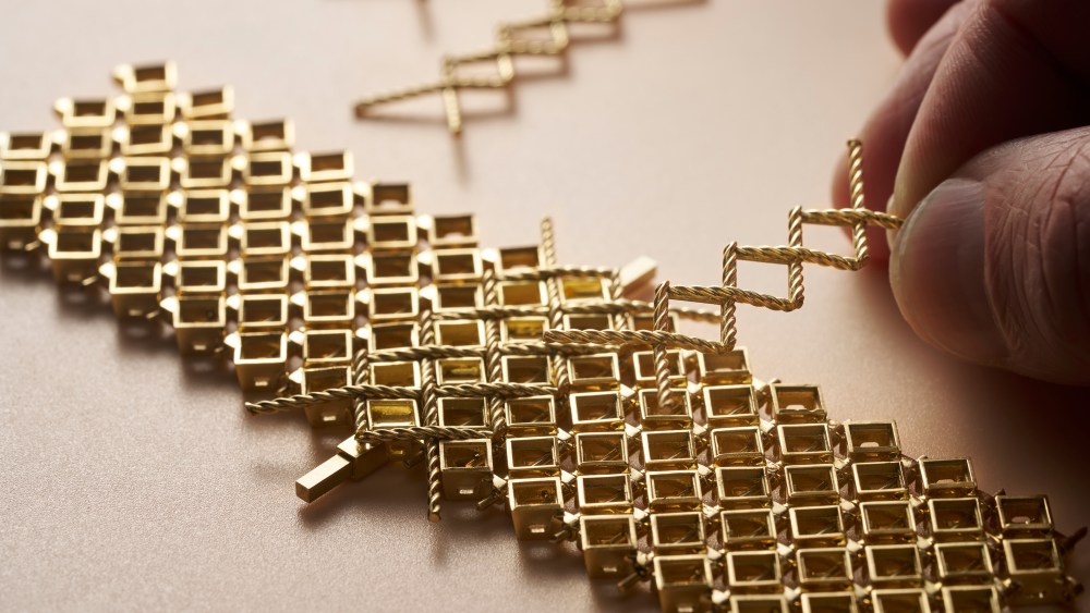 The twisted gold mesh that underpins the Embroidered Slivers watch bracelet, one of the masterpieces of Piaget's “Essence of Extraleganza” high jewelry collection