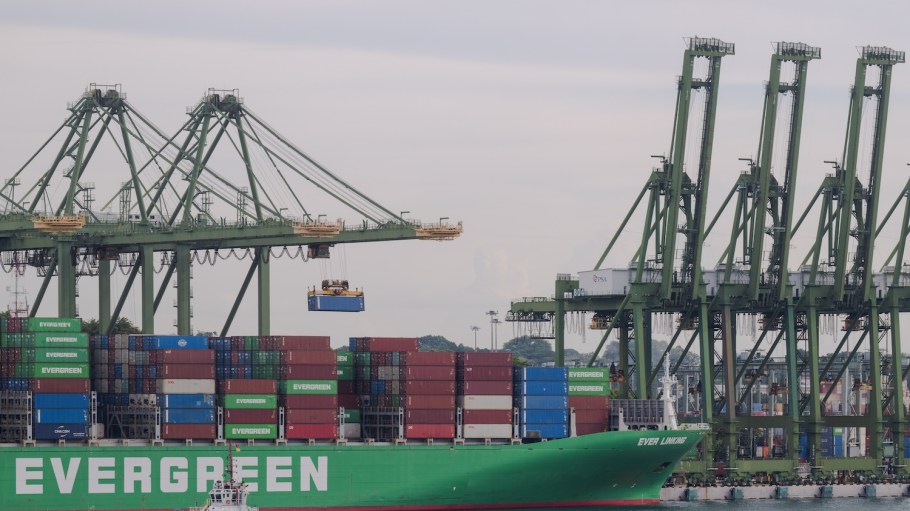 A vessel is unloading at the Brani Container Terminal in Singapore on April 30, 2024. The city's port terminals in Singapore are planned to be moved to Tuas in the western part of the island by 2027.