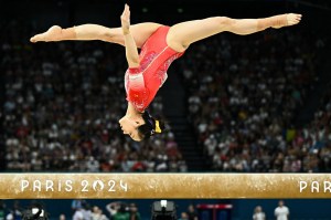 China's Luo Huan competes in the balance beam event of the artistic gymnastics women's team final during the Paris 2024 Olympic Games at the Bercy Arena in Paris, on July 30, 2024.