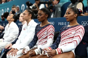 Sunisa Lee, Jade Carey, Hezly Rivera, Simone Biles and Jordan Chiles of Team United States look on during the Artistic Gymnastics Women's Team Final on day four of the Olympic Games Paris 2024 at Bercy Arena on July 30, 2024 in Paris, France.