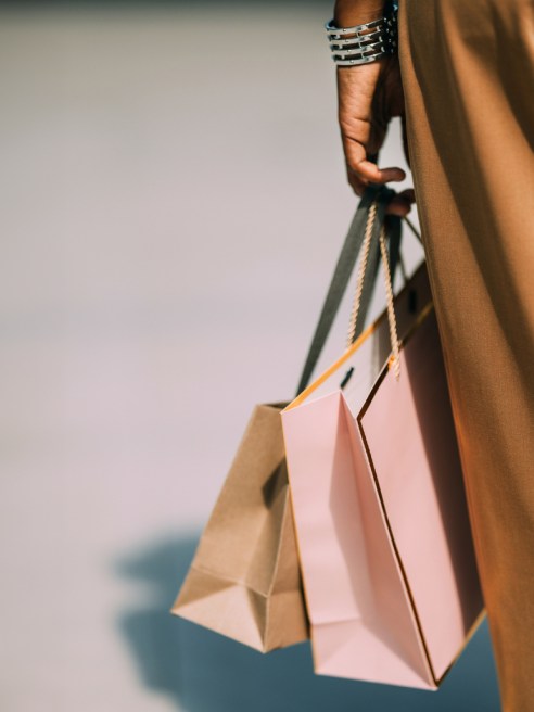 An earlier start to back-to-school and holiday has consumers hunting for deals during Amazon Prime and retailers' competing July discounts.
