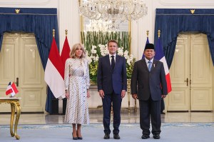 Indonesia's President Prabowo Subianto (R) receives France's President Emmanuel Macron (C) and his wife Brigitte Macron at Merdeka Palace in Jakarta on May 28, 2025. (Photo by Ludovic MARIN / AFP) (Photo by LUDOVIC MARIN/AFP via Getty Images)