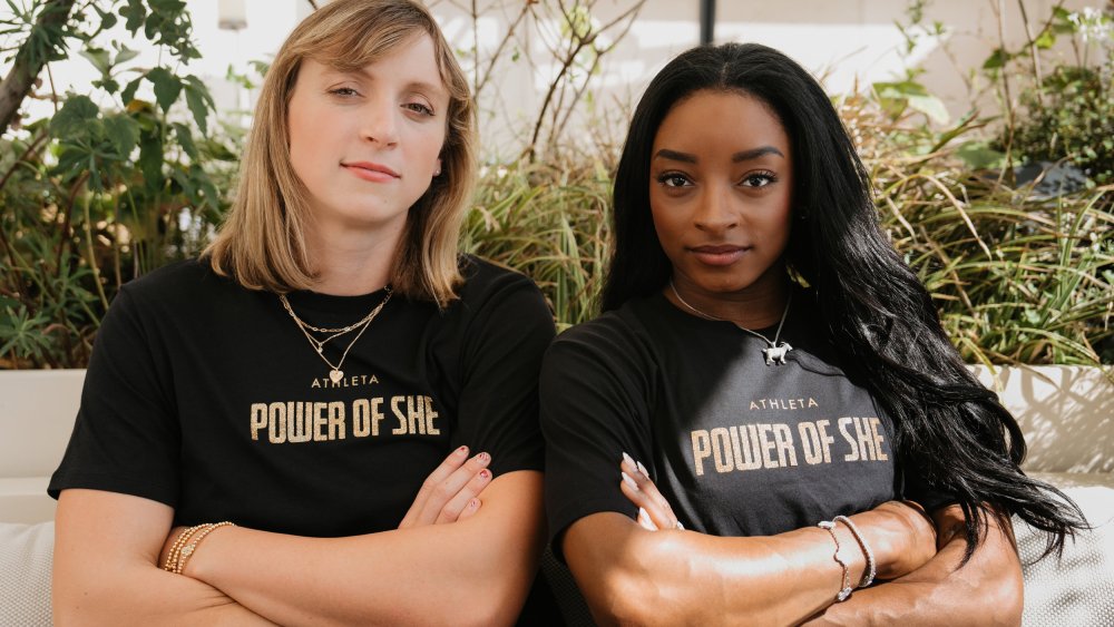 Katie Ledecky and Simone Biles in Power of She shirts.