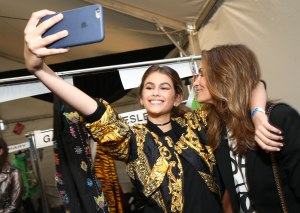 Kaia Gerber and Cindy Crawford backstage at the Moschino Men's Spring and Women's Resort 2017 show.