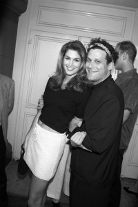 Cindy Crawford hanging out with fashion designer Isaac Mizrahi at the post-premiere party for ‘Unzipped’ inside the Beverly Hills Barneys New York store, where some 500 people were free to roam all five floors of the store which remained open for these illustrious shoppers with ten percent of the proceeds going to the AIDS charity AmFAR.
