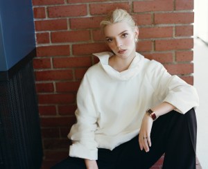 Carven silk blouse; Ralph Lauren Collection wool tuxedo pants; Jaeger-LeCoultre Reverso Tribute Small Seconds; Jean Schlumberger by Tiffany Apollo ear clips in gold with diamonds in platinum.
