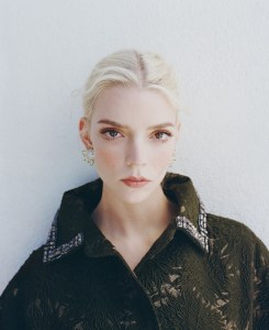 Max Mara Atelier silk and metallic fiber blend coat; Jean Schlumberger by Tiffany Apollo ear clips in gold with diamonds in platinum.
