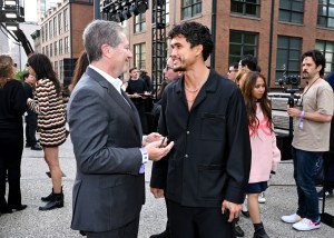 Todd Kahn and Charles Melton at the Coach Spring 2025 Ready-to-Wear show