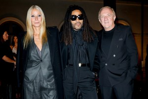 Gwyneth Paltrow, Lenny Kravitz and François-Henri Pinault at the Saint Laurent Spring 2025 ready-to-wear show