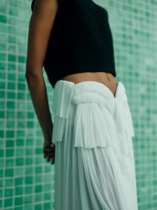 A preview of the Tory Burch Spring 2025 collection, showing at the Domino Sugar Factory.