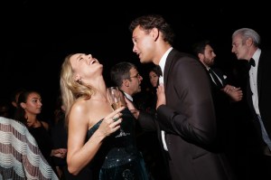 Brie Larson and Cooper Koch at the Giorgio Armani Spring 2025 Ready-to-Wear show